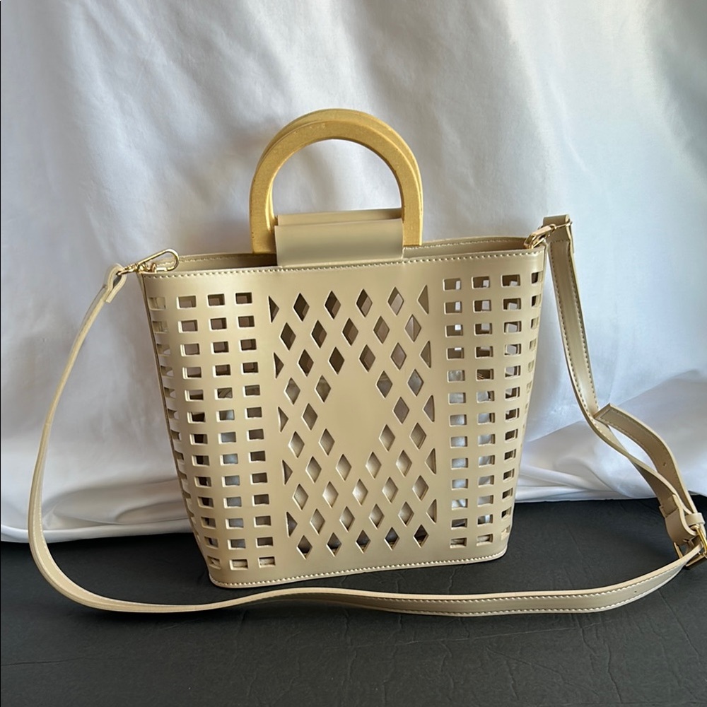Elegant Fashion Cream Handbag with Cutout Design